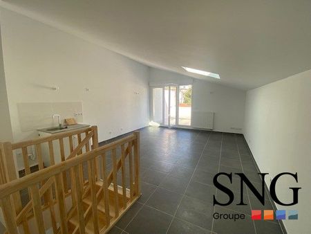 T3 AVEC DEUX TERRASSES ET UN GARAGE - Photo 2