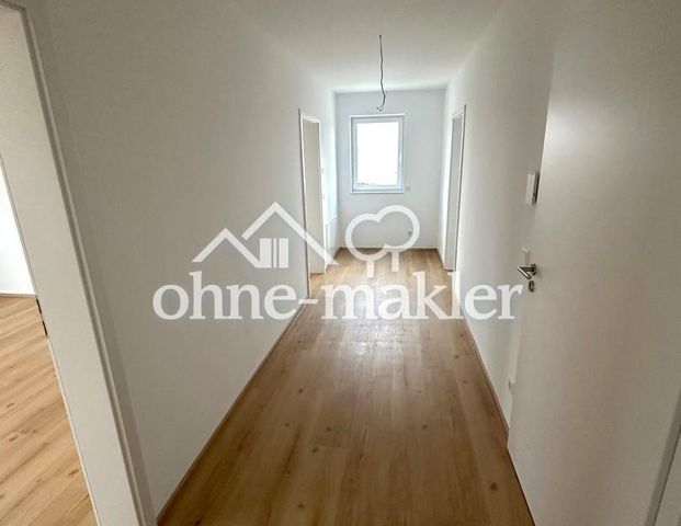 Exklusiver Neubau-Erstbezug: 3-Zimmer-Wohnung mit Einbauküche & Glasfaser in Erlangen-Steudach - Photo 1