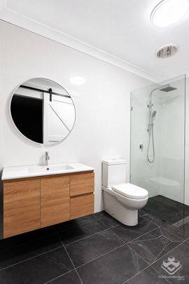 Fully Renovated Three-Bedroom Home in Peaceful Surfers Palms East - Photo 1
