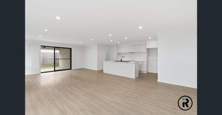 Stunning Family Home with Modern Comforts & Premium Features - Photo 3