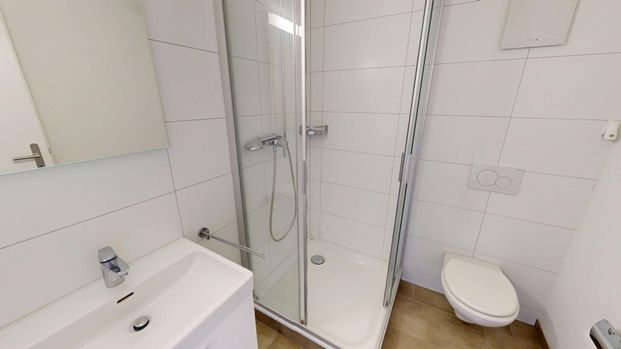 Moderne 1.5 Zimmer-Wohnung an zentraler Lage - Foto 1