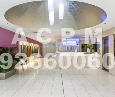 Unfurnished 2 bedroom plus car space for rent in the heart of CBD! - Photo 2