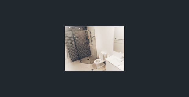 RENOVATED & FURNISHED 2 BEDROOM SPLIT LEVEL APARTMENT - Photo 1