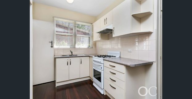 Open the Door To Comfortable Living in a Leafy City-Fringe Setting - Photo 1