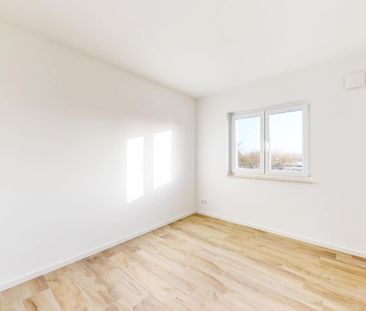 Familienfreundliche Doppelhaushälfte mit hellem Wohnbereich und hoc... - Foto 1