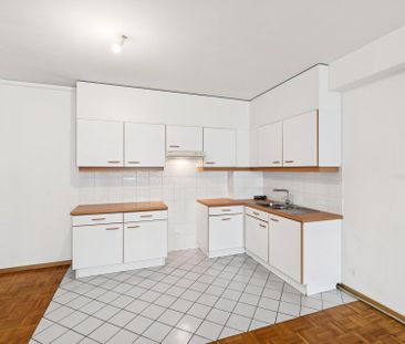 Appartement de 3 pièces situé en plein centre-ville - Photo 2