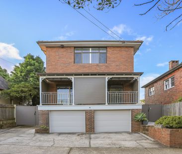 Exquisite 3 Bedroom Duplex with Granny Suite - Photo 1