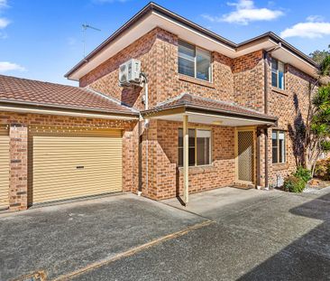 Freshly Renovated Townhouse Offering Easy, Modern Living - Photo 6