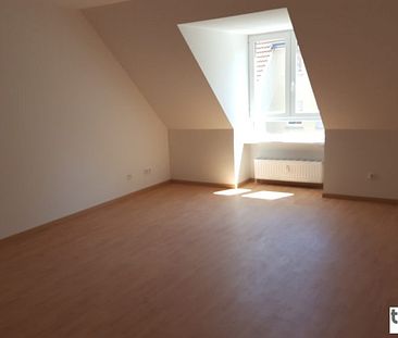 Geräumige 1-Zi-DG-Wohnung mit Einbauküche und neu gefliesten Bad in ruhiger und grüner Stadtrandlage. - Foto 6