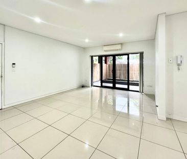 Spacious and Modern Apartment in a Prime Yagoona Location - Photo 1