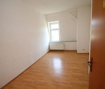 Gemütliche 3-Raum-Dachgeschosswohnung mit zusätzlichem Appartement! - Photo 4