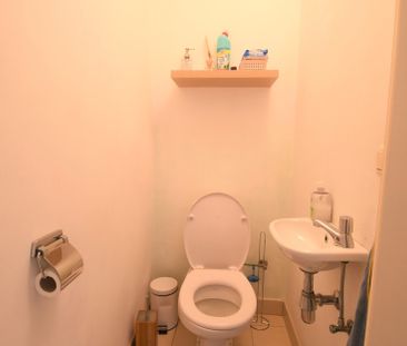 Gelijkvloers appartement met 2 slaapkamers, tuin en garage. - Foto 2