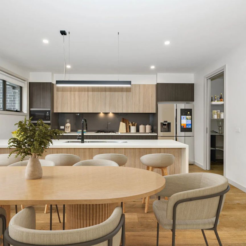 Stylish Townhouse Offering Effortless Modern Living - Photo 1