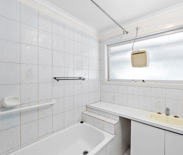 Spacious Four-Bedroom Home with Gardening Included - Photo 4