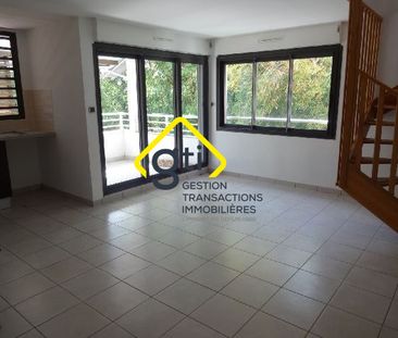 Location Appartement 3 pièces 56m² STE CLOTILDE 97490 - Photo 1