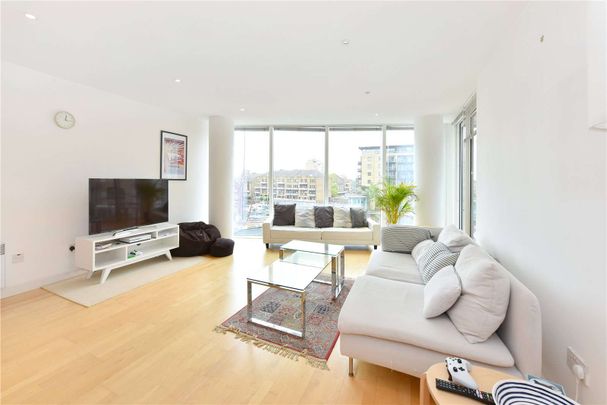 A light, bright and spacious three bedroom apartment situated on the second floor of this modern waterside development located in the heart of Limehouse Marina. - Photo 1