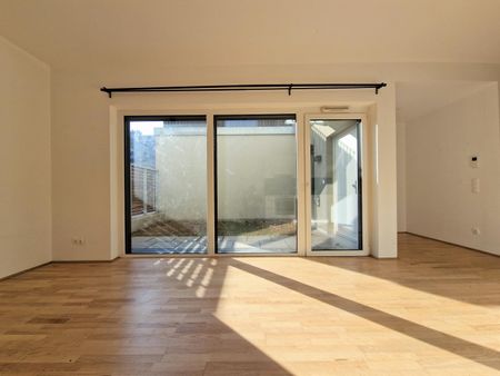 Schicke Neubauwohnung mit kl. Garten in idyllischer Ruhelage - Photo 5