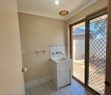 Cosy Three Bedroom Home with Generous Backyard - Photo 1