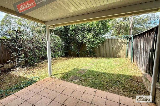 Located: Walking Distance to Quakers Hill Station: NO CARPETS - Photo 1