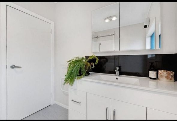 Charming 4BR Home in Papakura - Photo 1