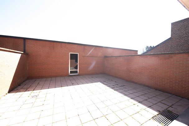 Gelijkvloersappartement met garagebox. - Photo 1