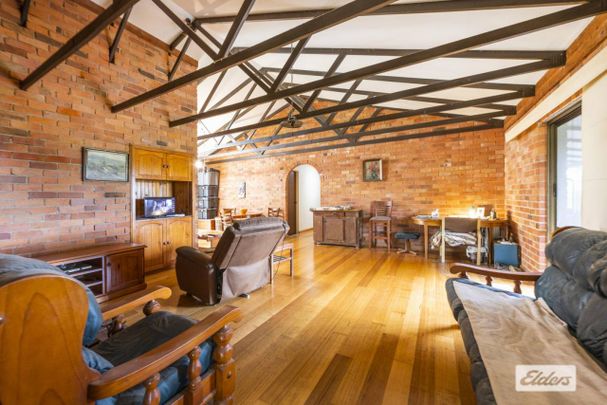 HIGH ON THE HILL - 4 BEDROOMS, 2 BATHROOMS - Photo 1