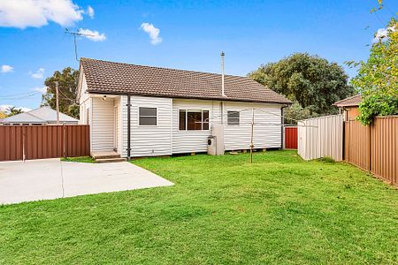 Charming 3-Bedroom Home with Modern Amenities and Ample Outdoor Space - Photo 3