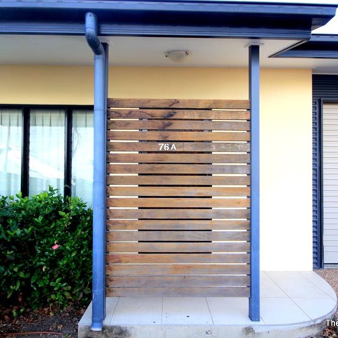 MORDERN DUPLEX TUCKED AWAY - Photo 1