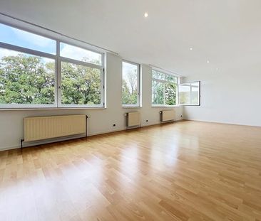 Appartement te huur - foto 2