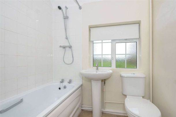 A three bedroom semi detached family home overlooking open fields. - Photo 1