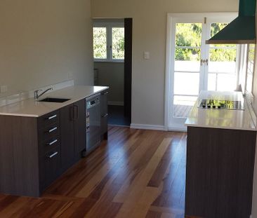 Charming 3BR Home with Deck & Garden - Photo 5