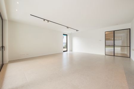 Prestigieus nieuwbouwappartement met ruime tuin en terras. - Foto 4