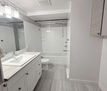 Grand 5½ rénové, 3 chambres, clim, 2 stationnements + rangement pri... - Photo 4