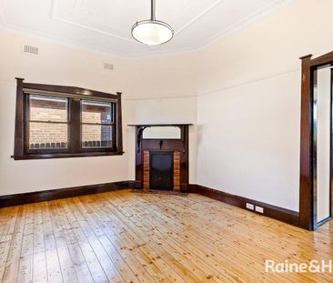 Stylish 4 Bedroom Home with Large Sunny Backyard - Photo 6