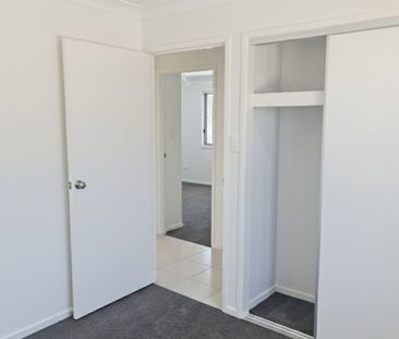 4 BEDROOM- 2 BATHROOM TOWNHOUSE WITH DUCTED AIRCON - Photo 2