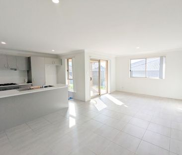MODERN DUPLEX IN SOUGHT AFTER ESTATE - Photo 1
