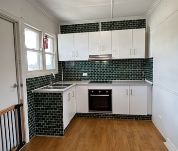Upstairs Unit - Convenient Location with Electricity and Water included!! - Photo 6