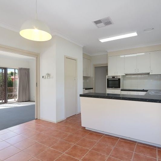 Spacious Two-Story Home with Versatile Layout! - Photo 1