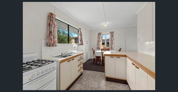 Well-Maintained 3-Bedroom Home with Fresh Paint Throughout. Mid term increase of $620 two months after new lease begins. - Photo 1