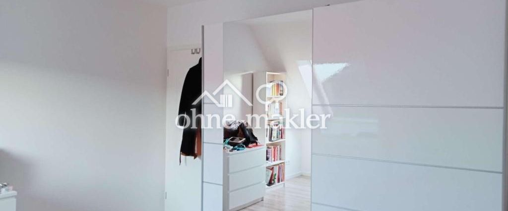 Sonnige Dachgeschosswohnung über dem Herzen der Stadt - Foto 1