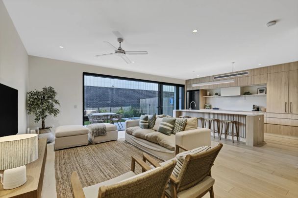 Fully Furnished Coastal Luxury – Beachside Living at Its Finest - Photo 1