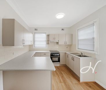 FRESHLY UPDATED HOME IN A CONVENIENT LOCATION - Photo 4