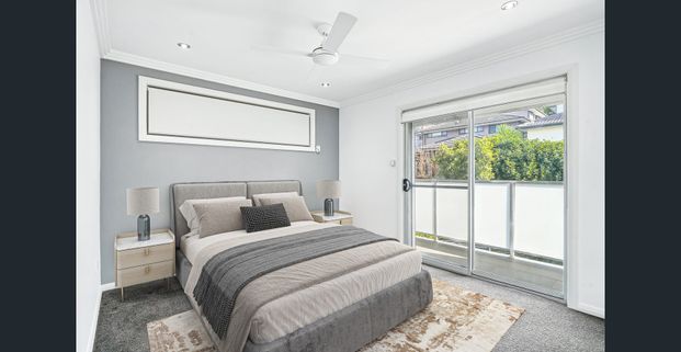 Modern Family Home with Basement Parking - Photo 1