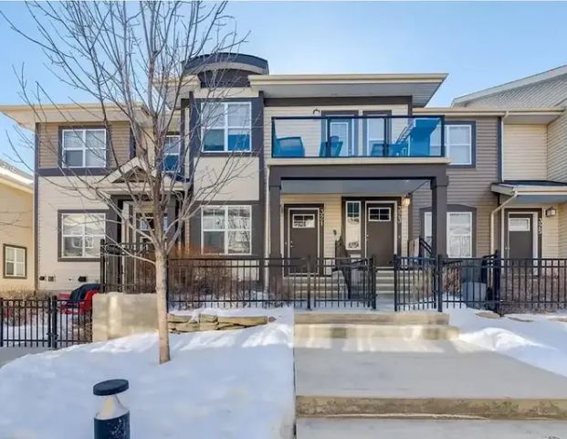 Mckenzie Towne Townhouse / Condo - Private Attached Garage | 321 McKenzie Towne Square Southeast, Calgary - Photo 1