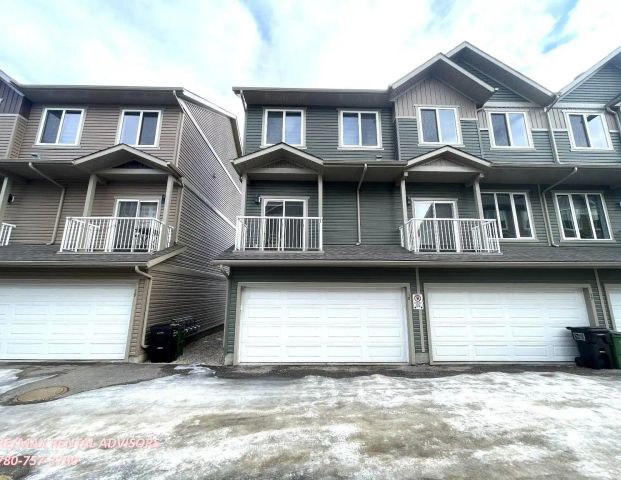 #17 1051 Graydon Hill Boulevard Southwest — Townhouse - Photo 1