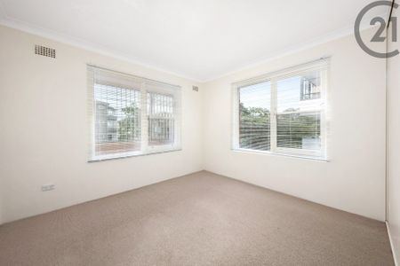 Large&comma; Sunfilled Apartment&comma; Sunroom&comma; Lock up Garage and Exceptional Value&period; - Photo 4