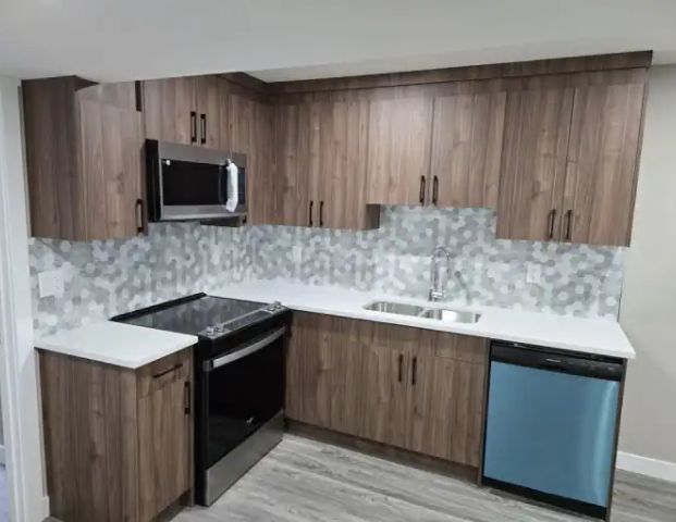 BRAND NEW 2 BEDROOM LEGAL BASEMENT SUITE IN REDSTONE COMMUNITY | 715 Redstone Drive Northeast, Calgary - Photo 1