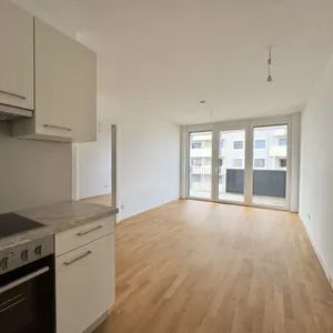 Wohnen mit Grünblick nahe U1 Kagraner Platz - Foto 1