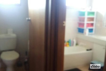 Charming 3 Bedroom Brick Home with Double Garage - Photo 5