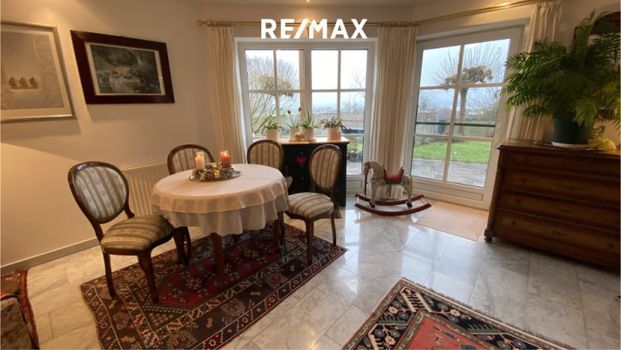 Großzügige Erdgeschoßwohnung in einer Landhausvilla mit Seeblick - Foto 1